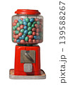 A retro gumball machine filled with colorful candies 139588267