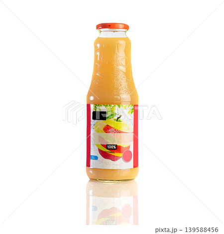 Juice in a glass bottle, bright colored drink on a white background isolated 139588456