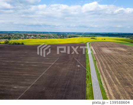 Drone image sunset in clouds with sunrays over road to horizon top wiew 139588604