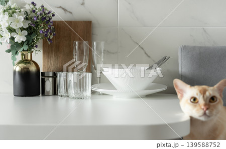 Minimal dining table setting in modern apartment interior 139588752