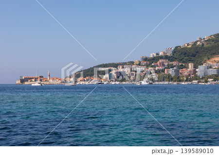 Coastal panorama of Budva old town and marina on the Adriatic Sea, Montenegro Coastal panorama of Budva old town and marina on the Adriatic Sea, Montenegro 139589010