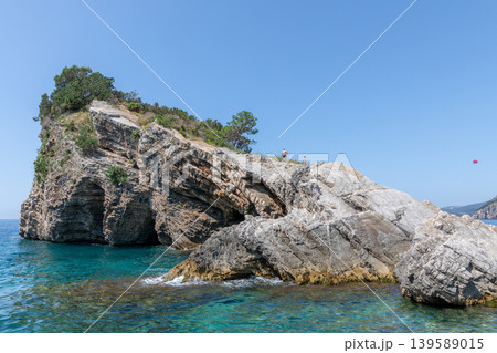 Rocky coastline and turquoise Adriatic Sea at Sveti Nikola Island, Budva Rocky coastline and turquoise Adriatic Sea at Sveti Nikola Island, Budva 139589015