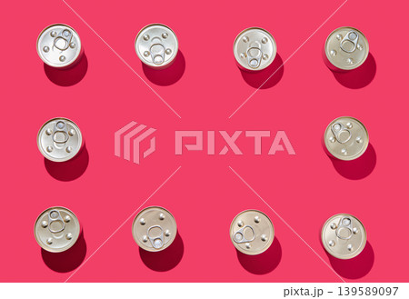 Frame of metal tin cans on pink background 139589097