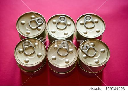 Metal tin cans on pink background 139589098