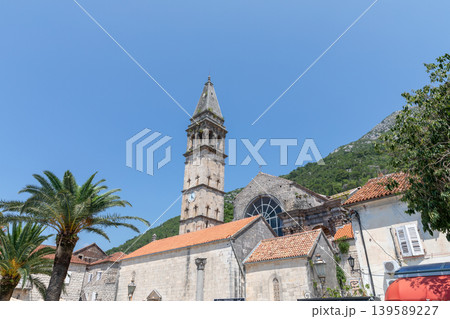 Historic church bell tower and stone rooftops in Perast old town, Montenegro Historic church bell tower and stone rooftops in Perast old town, Montenegro 139589227