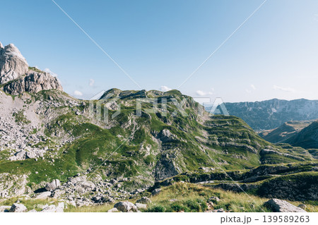 Bobotov Kuk peak and rugged alpine landscape in Durmitor National Park, Montenegro Bobotov Kuk peak and rugged alpine landscape in Durmitor National Park, Montenegro 139589263