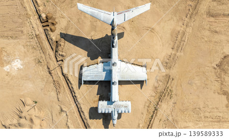 Aerial top view of abandoned ekranoplan on sandy shore in Arablyar 139589333