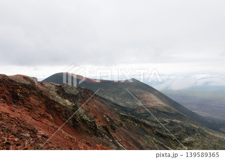 Volcanic ridge and lava fields in North Breakthrough area under cloudy sky Volcanic ridge and lava fields in North Breakthrough area under cloudy sky 139589365