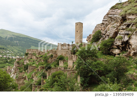 Ancient stone tower and abandoned mountain village ruins in Kahib, Dagestan 139589409