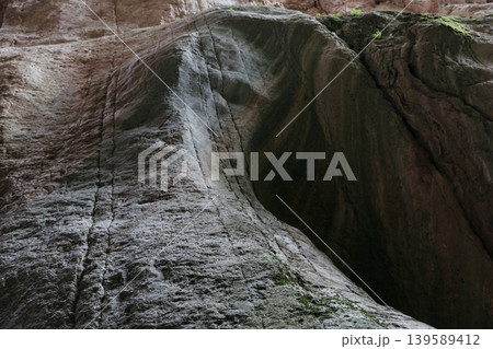 Rock walls and narrow canyon passage in Karadakh Gorge, Dagestan, Russia Rock walls and narrow canyon passage in Karadakh Gorge, Dagestan, Russia 139589412