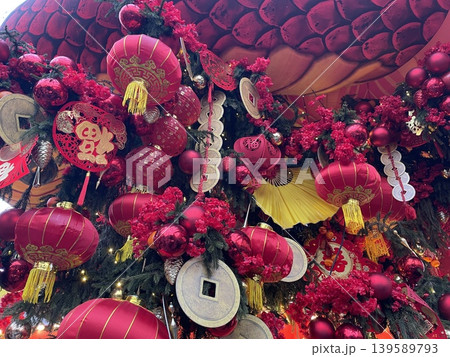 Chinese New Year decorations with red lanterns and gold ornaments for festive celebration background 139589793