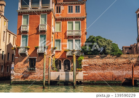 Classic Venice Grand canal houses viewed from vaporetto boat - waterbus. Italy. Classic Venice Grand canal houses viewed from vaporetto boat - waterbus. Italy. 139590229