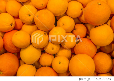 Orange bright vibrant fresh food group tangerine background citrus ripe fruit orange tropical Orange bright vibrant fresh food group tangerine background citrus ripe fruit orange tropical 139590825