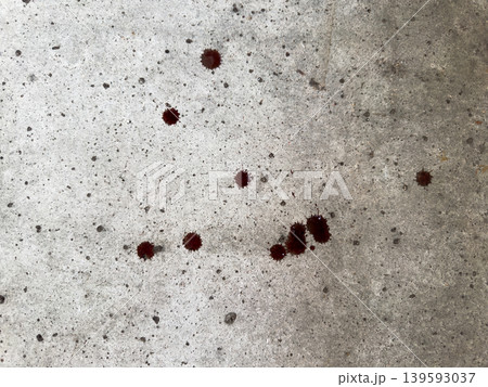 Close-up of blood drops on concrete floor, dark red stains on rough surface for crime scene illustration and forensic examination 139593037