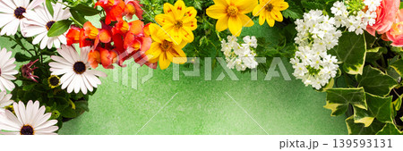 A beautiful collection of spring flowers decorates a balcony or terrace, creating a lively and cheerful atmosphere. Various colors and types of flowers bring joy to the space., banner A beautiful collection of spring flowers decorates a balcony or terrace, creating a lively and cheerful atmosphere. Various colors and types of flowers bring joy to the space., banner 139593131