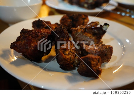 Grilled Lamb Shashlik Skewers on a White Plate Grilled Lamb Shashlik Skewers on a White Plate 139593259