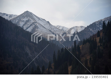 Breathtaking view of Shymbulak mountain peaks with snow in Almaty, Kazakhstan. Breathtaking view of Shymbulak mountain peaks with snow in Almaty, Kazakhstan. 139593401