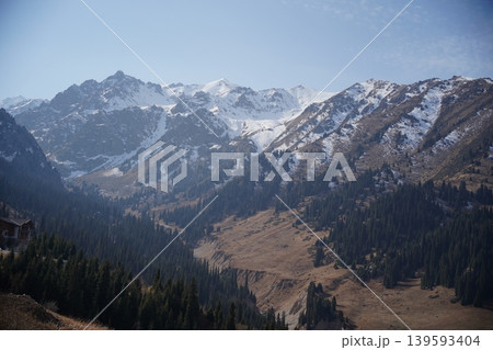 Breathtaking view of Shymbulak mountain peaks with snow in Almaty, Kazakhstan. 139593404