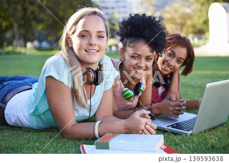 Portrait, laptop or students on grass at college, campus or together with online course, smile or group. University, relax or happy friends bond with support, teamwork or diversity in education 139593638