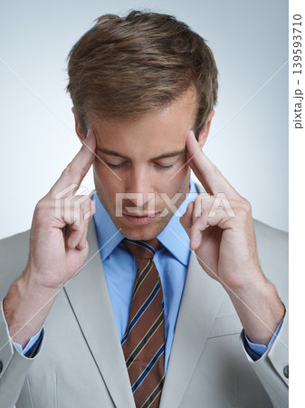 Businessman, headache and burnout in studio for job, mental health and bankrupt or stress. Male person, migraine and frustrated by white background, deadline and depression or mistake and tension 139593710