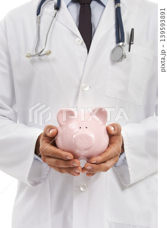 Doctor, man and piggy bank for savings in studio, investment and financial loan for healthcare. Male professional, funding and planning hospital budget by white background, profit and future security 139593891