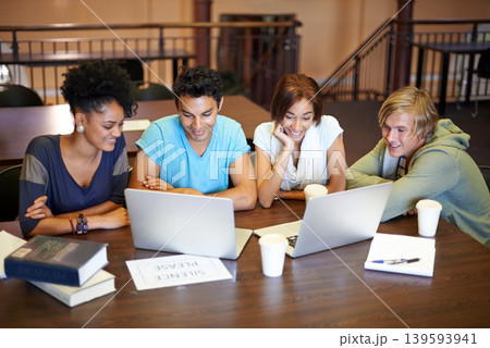 Teamwork, laptop or students studying together in school, university library or college for education. Diversity, elearning or group of people with scholarship reading news, research or online course Teamwork, laptop or students studying together in school, university library or college for education. Diversity, elearning or group of people with scholarship reading news, research or online course 139593941