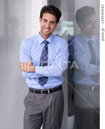 Window, crossed arms and portrait of business man in workplace with confidence, pride and ambition. Corporate entrepreneur, professional and happy worker for career, job and working in modern office Window, crossed arms and portrait of business man in workplace with confidence, pride and ambition. Corporate entrepreneur, professional and happy worker for career, job and working in modern office 139594042