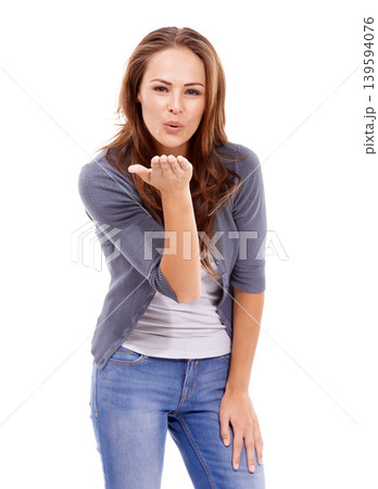 Portrait, happy woman and blow kiss in studio for love, care and romance with flirting sign isolated on white background. Young model with hand gesture for emoji, reaction and date on valentines day 139594076