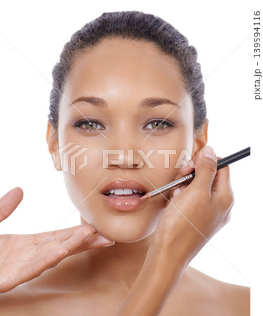 Woman, lip gloss and makeup application in portrait, cosmetics and beauty tools or equipment. Female model person, studio and wellness by white background, skincare and luxury lipstick aesthetic Woman, lip gloss and makeup application in portrait, cosmetics and beauty tools or equipment. Female model person, studio and wellness by white background, skincare and luxury lipstick aesthetic 139594116