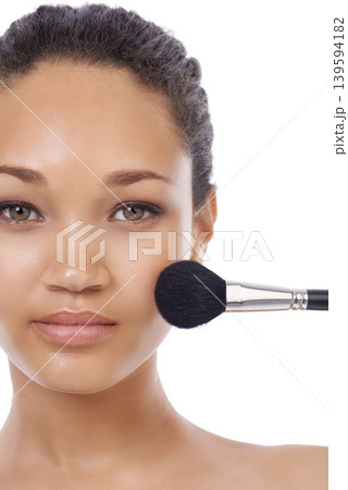 Cosmetics, brush and woman face in studio for beauty, foundation and makeup on a white background. Portrait of young model, artist and person for skincare, application tools or product for coverage Cosmetics, brush and woman face in studio for beauty, foundation and makeup on a white background. Portrait of young model, artist and person for skincare, application tools or product for coverage 139594182