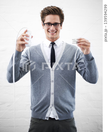 Person, cable plug and businessman in fashion, smiling and happy for connection, professional and employee..Technician, technical geek and ready as manager, electricity and energy extenstion Person, cable plug and businessman in fashion, smiling and happy for connection, professional and employee..Technician, technical geek and ready as manager, electricity and energy extenstion 139594299
