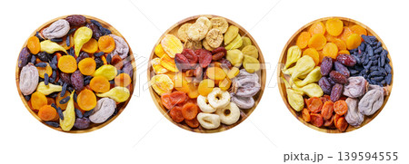 Set of various plates of dries fruits isolated on white background 139594555