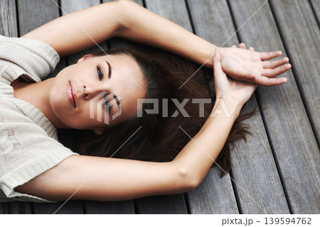 Woman, face and happy on porch for relax outdoor in backyard with break, lying down and rest in home. Person, portrait and smile on wooden deck in garden of house or apartment with carefree or casual Woman, face and happy on porch for relax outdoor in backyard with break, lying down and rest in home. Person, portrait and smile on wooden deck in garden of house or apartment with carefree or casual 139594762