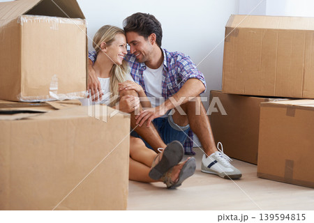 Couple, boxes and happy with hug for real estate, new home or property investment with romance or love. Moving, man and woman with smile, care and embrace for fresh start, achievement and dream house Couple, boxes and happy with hug for real estate, new home or property investment with romance or love. Moving, man and woman with smile, care and embrace for fresh start, achievement and dream house 139594815