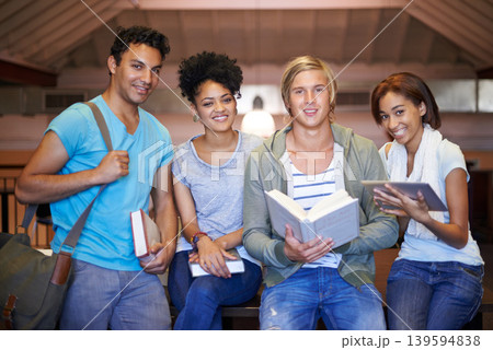 Library, students and group at university in portrait, people and books for development at academy. Friends, reading and happy for learning with studying, scholarship or education for test at college 139594838