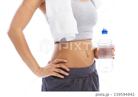 Woman, hands and water bottle with towel for fitness, hydration against a white studio background. Closeup of female person or athlete with natural mineral drink for health and wellness on mockup Woman, hands and water bottle with towel for fitness, hydration against a white studio background. Closeup of female person or athlete with natural mineral drink for health and wellness on mockup 139594842