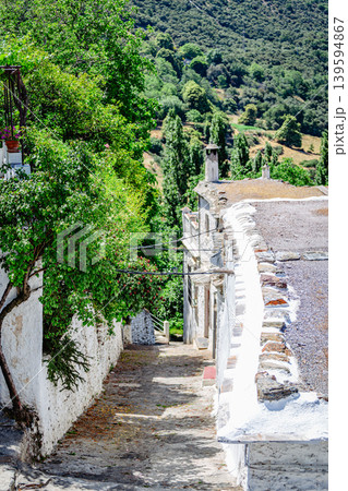 Typical street of an Andalusian village Bubion. Typical street of an Andalusian village Bubion. 139594867