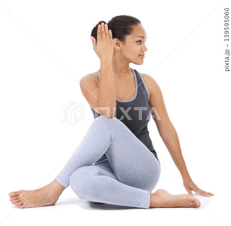 Yoga, stretching and woman on a white background for fitness, workout and zen exercise with holistic wellness or muscle health. Flexible and young person with half lord of the fishes pose in studio 139595060