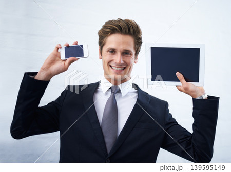 Business man, tablet and phone screen in portrait, smile and mock up space for promotion by white background. Entrepreneur, person and happy employee with blank smartphone, touchscreen and ux for app Business man, tablet and phone screen in portrait, smile and mock up space for promotion by white background. Entrepreneur, person and happy employee with blank smartphone, touchscreen and ux for app 139595149