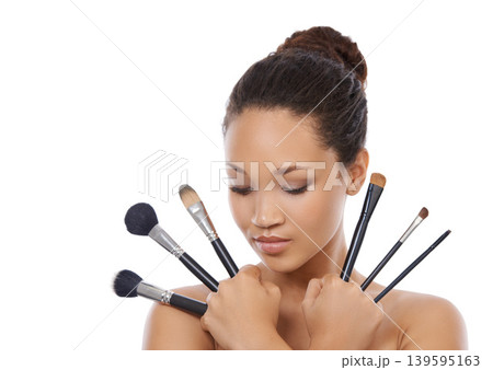 Woman, beauty and makeup brushes for cosmetics in studio, choice and decision for powder. Female model person, tools and equipment for application, skincare and facial treatment by white background 139595163