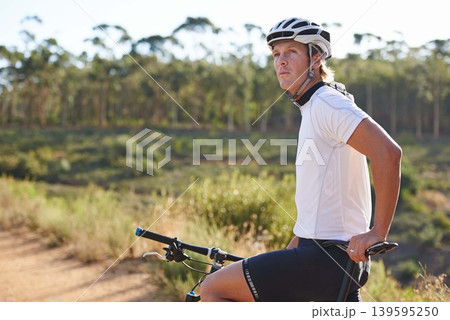 Man, cyclist and thinking on mountain bicycle, training and energy for rider, cycling and sport. Outdoor, hobby and fitness in nature, trail and active for wellness, helmet and physical workout Man, cyclist and thinking on mountain bicycle, training and energy for rider, cycling and sport. Outdoor, hobby and fitness in nature, trail and active for wellness, helmet and physical workout 139595250
