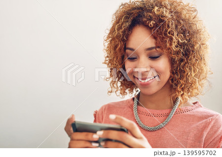 Phone games, smile or happy woman on break playing online gaming, subscription or connection. Designer ,video gamer or African person with mobile app in workplace for streaming multimedia to relax Phone games, smile or happy woman on break playing online gaming, subscription or connection. Designer ,video gamer or African person with mobile app in workplace for streaming multimedia to relax 139595702