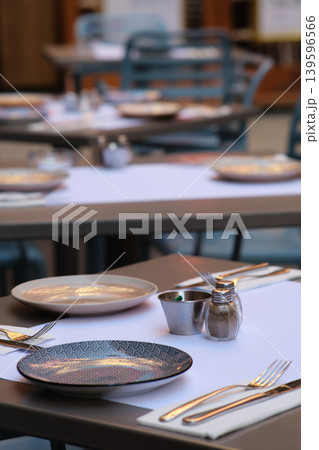 Beautiful table setting in the restaurant Beautiful table setting in the restaurant 139596566