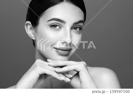 Portrait beautiful young woman with clean fresh skin 139597100