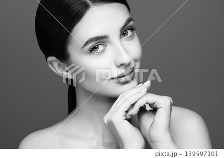 Portrait beautiful young woman with clean fresh skin Portrait beautiful young woman with clean fresh skin 139597101