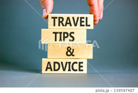 Travel tips and advice words symbol. Concept words Travel tips and advice on beautiful wooden blocks. Beautiful grey background. Business lifestyle travel tips and advice concept. Copy space. Travel tips and advice words symbol. Concept words Travel tips and advice on beautiful wooden blocks. Beautiful grey background. Business lifestyle travel tips and advice concept. Copy space. 139597487