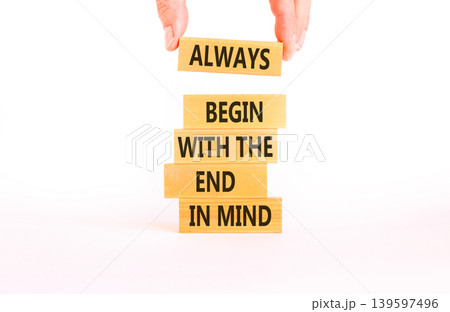 Begin with the end in mind symbol. Concept words Always begin with the end in mind on beautiful wooden blocks. Beautiful white background. Business begin with the end in mind concept. Copy space. 139597496