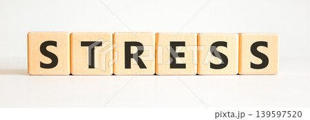 Stress word symbol. Concept word Stress on beautiful wooden blocks. Beautiful white background. Business psychological medical stress word concept. Copy space. 139597520