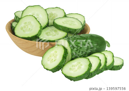 Sliced cucumber in wooden bowl isolated on white background with full depth of field 139597556