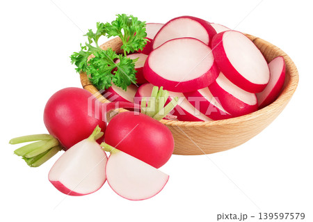 Radish slices in wooden bowl isolated on white background with full depth of field Radish slices in wooden bowl isolated on white background with full depth of field 139597579